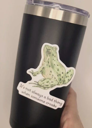 Video of applying high quality "It's not always a bad thing when someone croaks" sticker to black tumbler. 